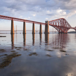 The Forth Rail Bridge connects the villages of South and North Queensferry across the Firth of Forth. When it opened in 1890 it was the longest single cantilever bridge span in the world. It is now a UNESCO World Heritage Site.